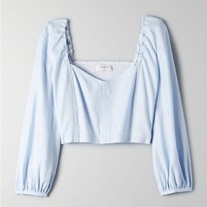 Aritzia Babaton Hadwyn Blouse in shade Glimmer (light blue)